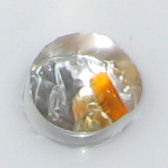 Gummibärchen in einer Aluminium-Teelichthülse; © (BIBER) Schulen ans Netz Gummibärchen in einer Aluminium-Teelichthülse; © (BIBER) Schulen ans Netz