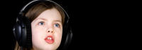 Kind mit Kopfhörer; copyright dreamstime