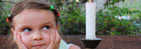 kind mit kerze; © dreamstime