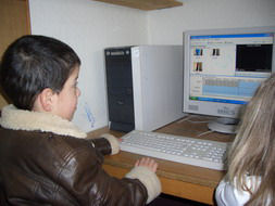 Kinder am PC;  (BIBER) Schulen ans Netz